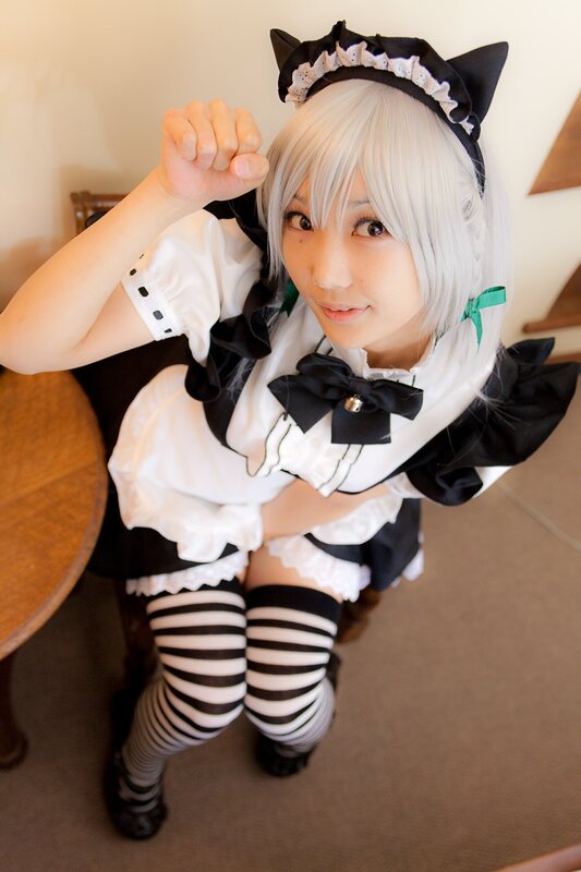 cosplayer in maid outfit