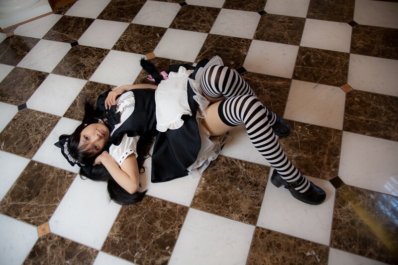cosplayer in maid outfit