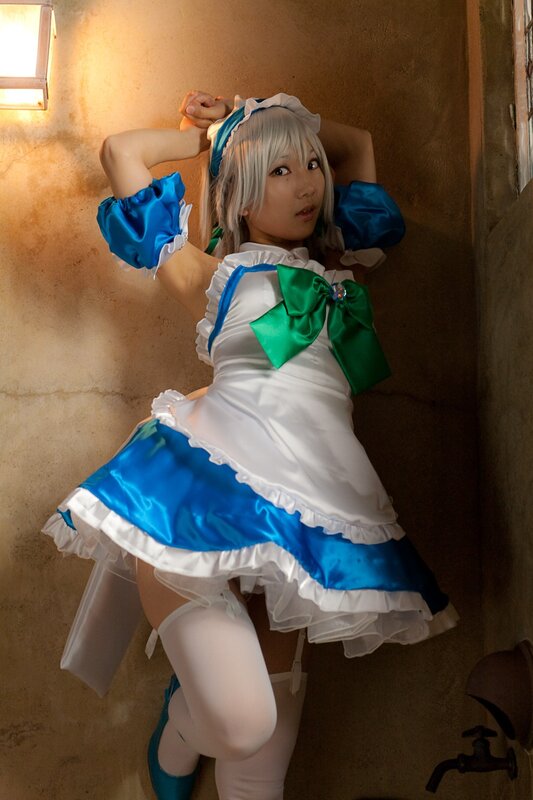 cosplayer in maid outfit