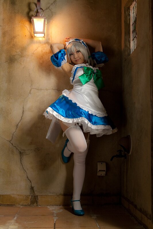 cosplayer in maid outfit