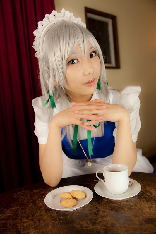 cosplayer in maid outfit