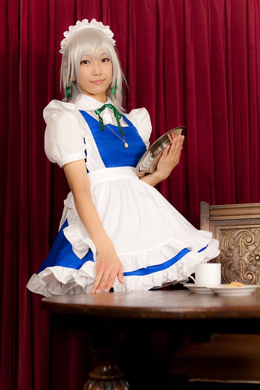 cosplayer in maid outfit