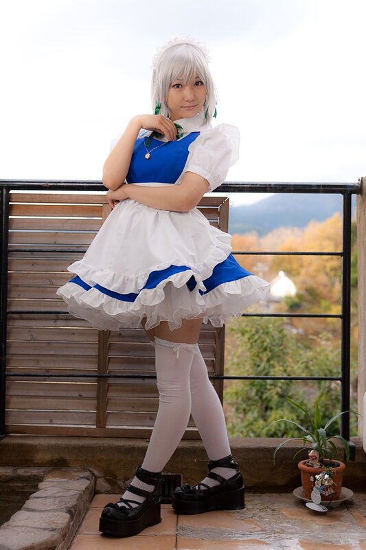 cosplayer in maid outfit