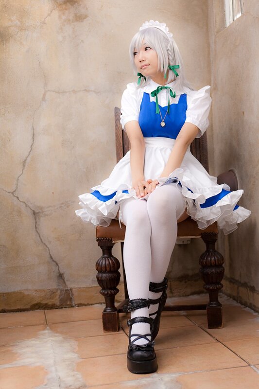 cosplayer in maid outfit