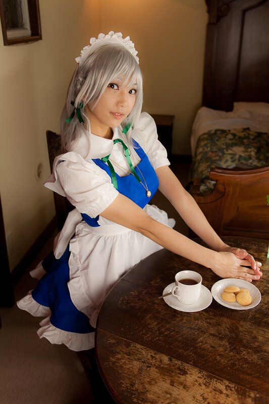 cosplayer in maid outfit