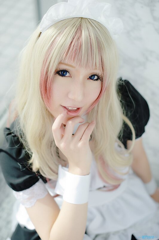 cosplayer in maid outfit