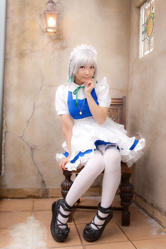 cosplayer in maid outfit