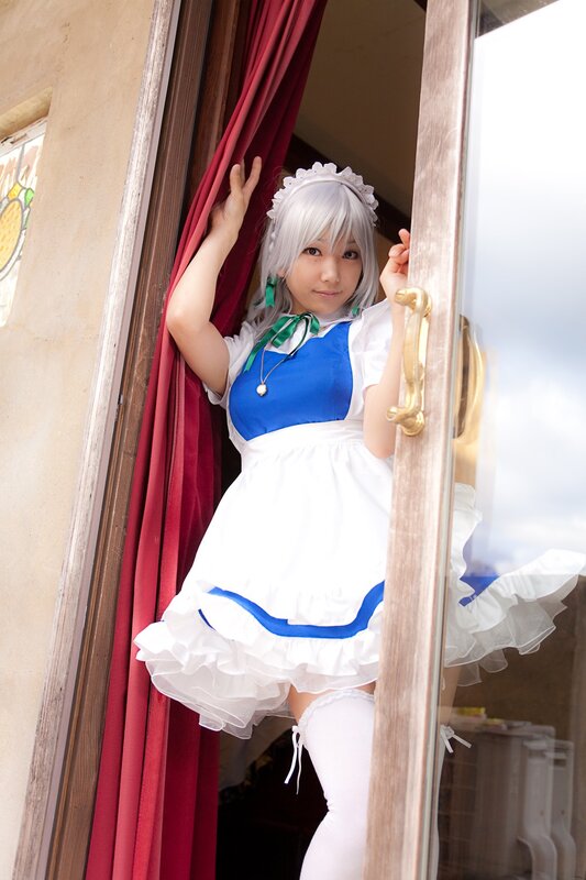 cosplayer in maid outfit