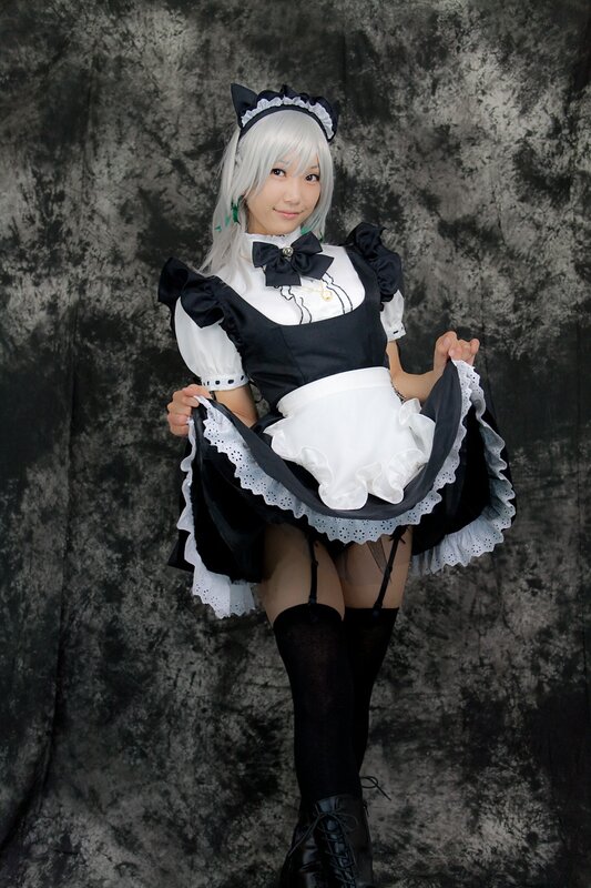 cosplayer in maid outfit