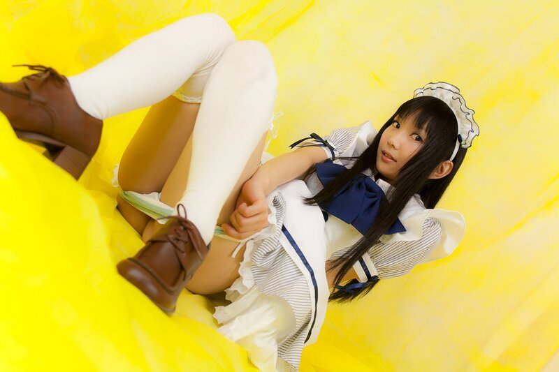 cosplayer in maid outfit
