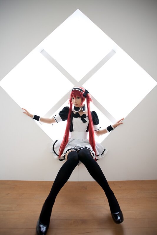 cosplayer in maid outfit