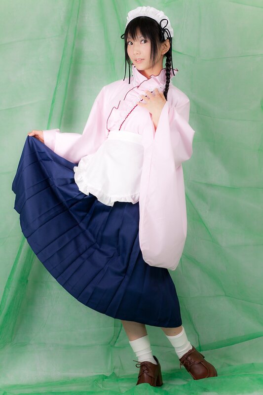 cosplayer in maid outfit