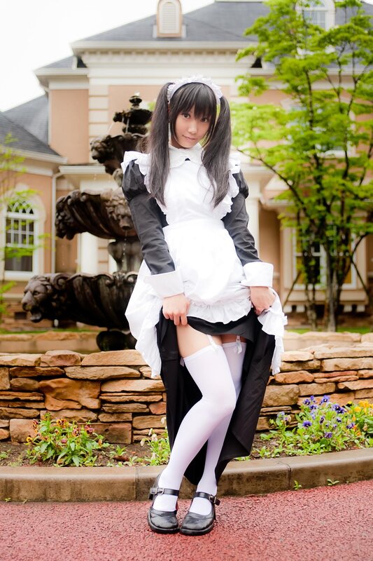 cosplayer in maid outfit