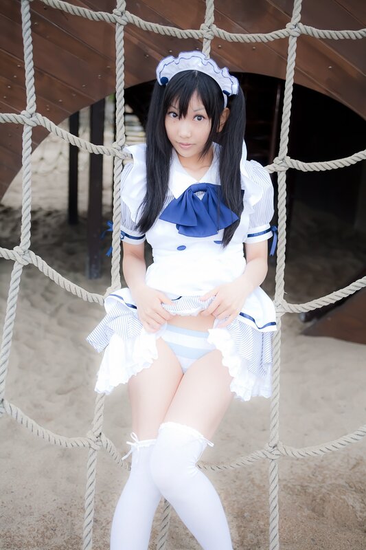 cosplayer in maid outfit