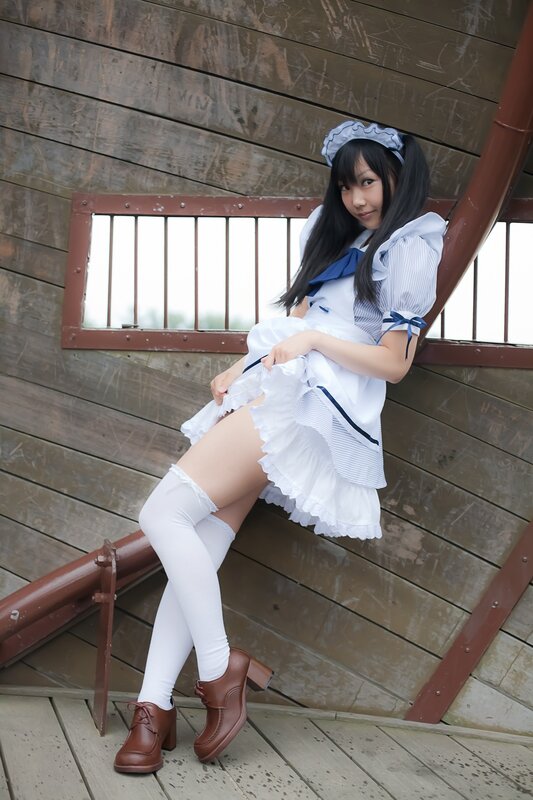 cosplayer in maid outfit