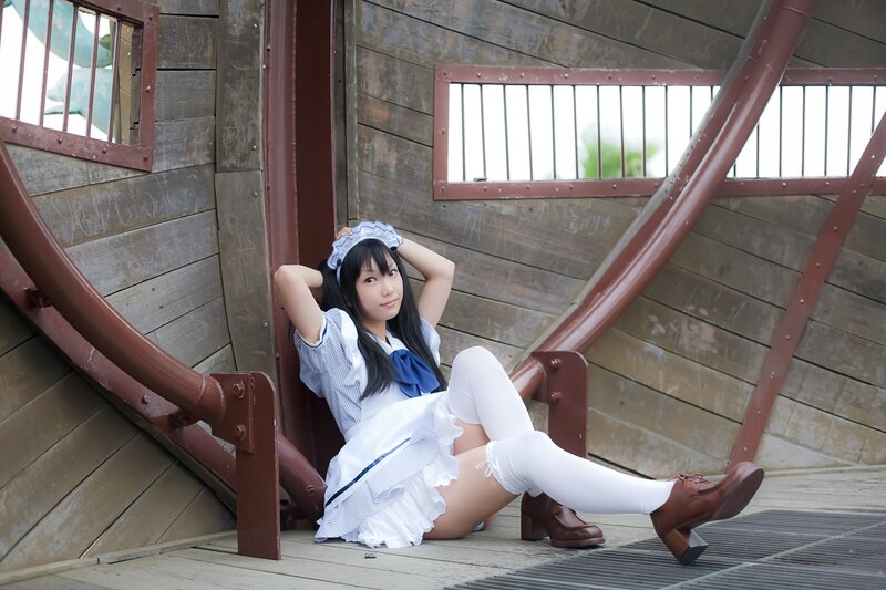 cosplayer in maid outfit