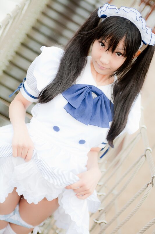 cosplayer in maid outfit