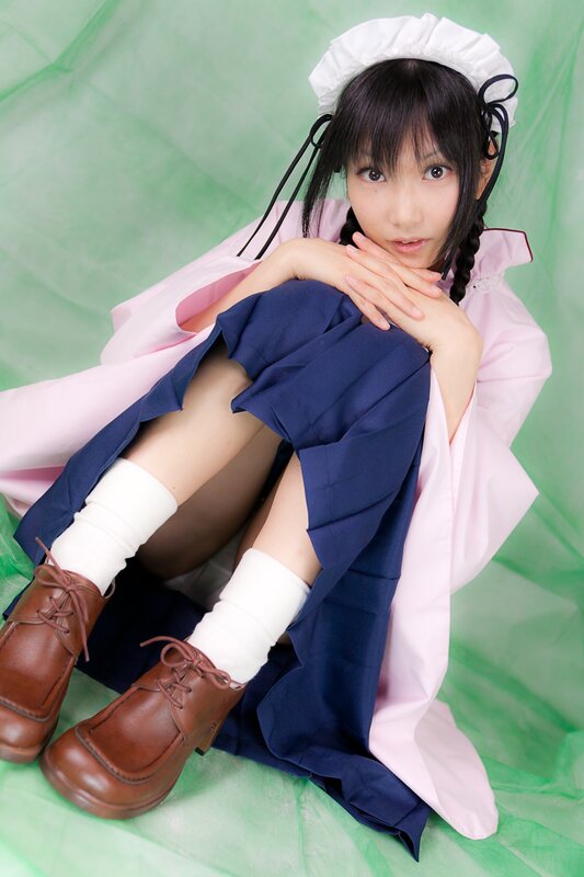 cosplayer in maid outfit