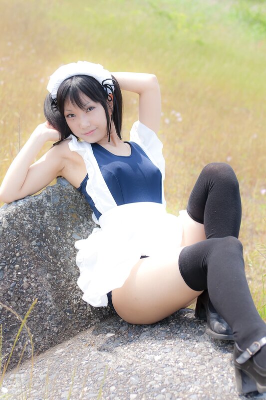 cosplayer in maid outfit