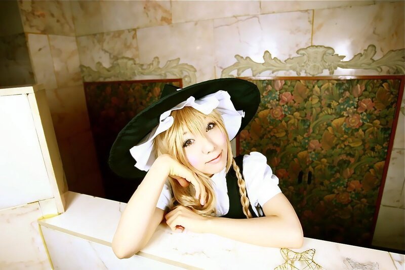 cosplayer in maid outfit