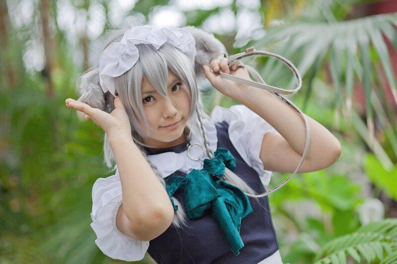 cosplayer in maid outfit