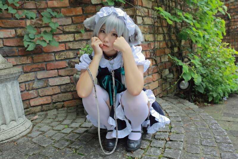 cosplayer in maid outfit