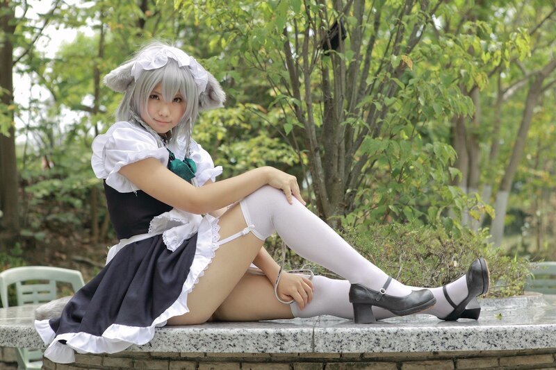 cosplayer in maid outfit