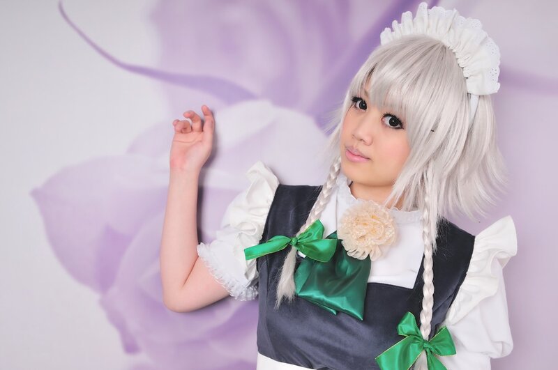 cosplayer in maid outfit