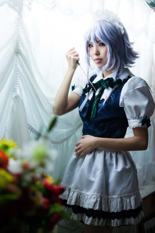 cosplayer in maid outfit