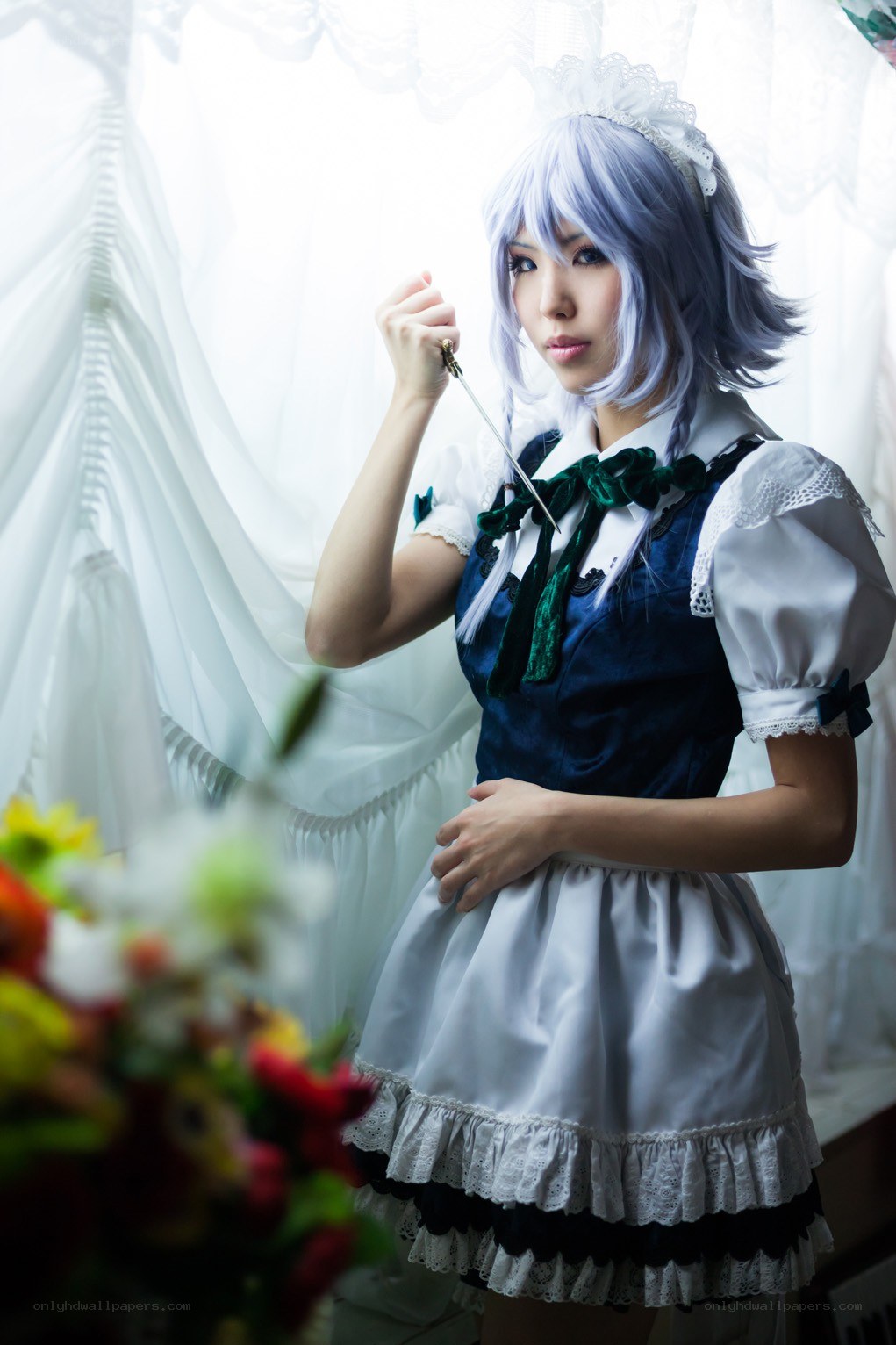 cosplayer in maid outfit