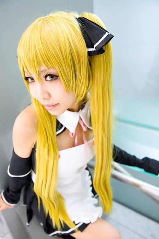 cosplayer in maid outfit