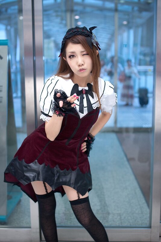 cosplayer in maid outfit