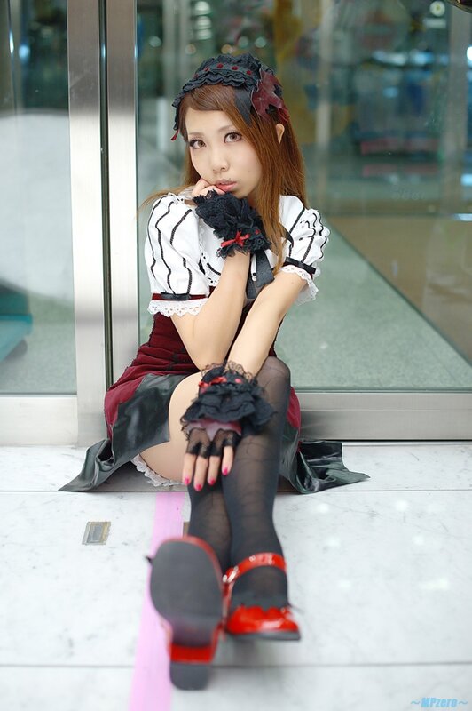 cosplayer in maid outfit