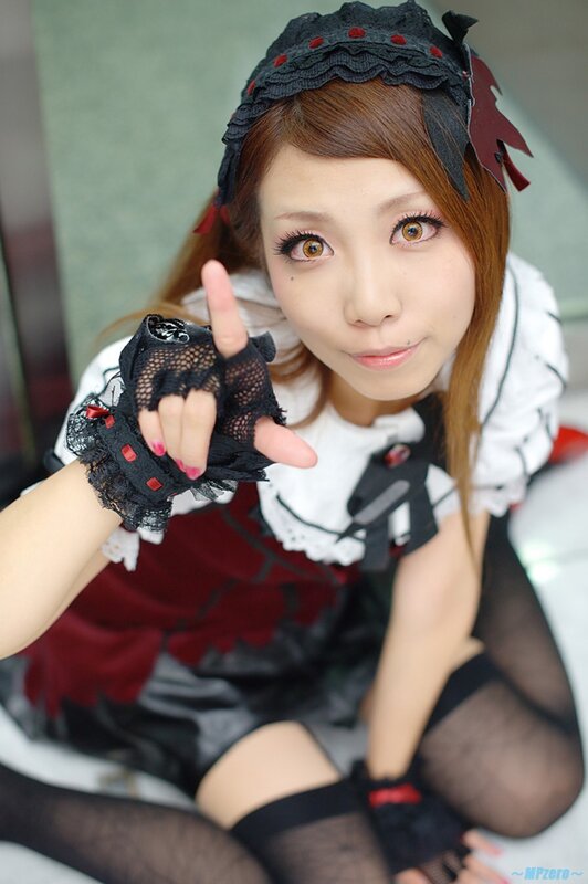 cosplayer in maid outfit