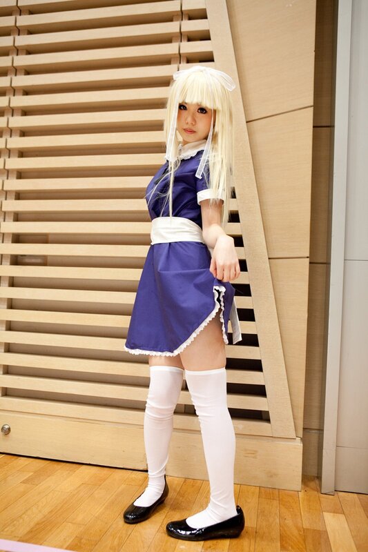 cosplayer in maid outfit