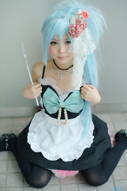 cosplayer in maid outfit