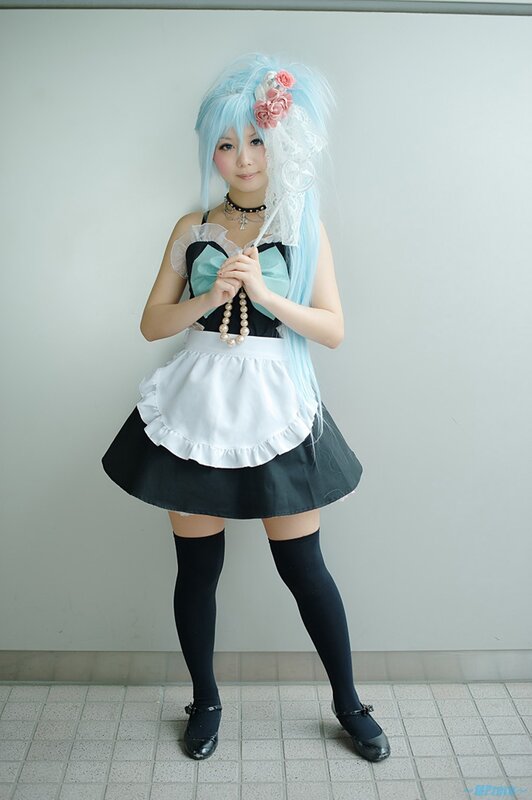 cosplayer in maid outfit