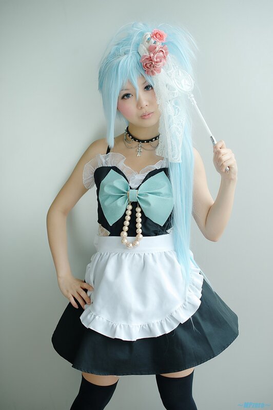 cosplayer in maid outfit