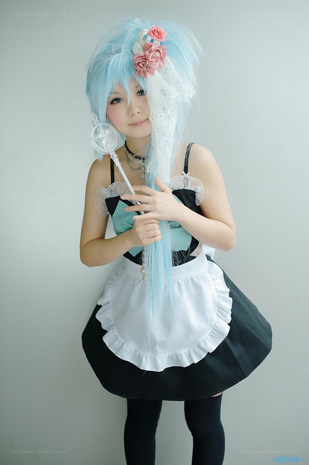 cosplayer in maid outfit