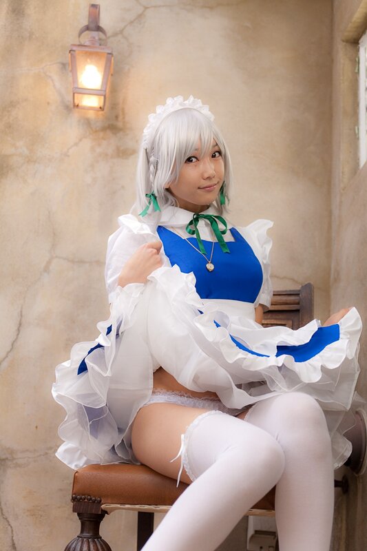 cosplayer in maid outfit