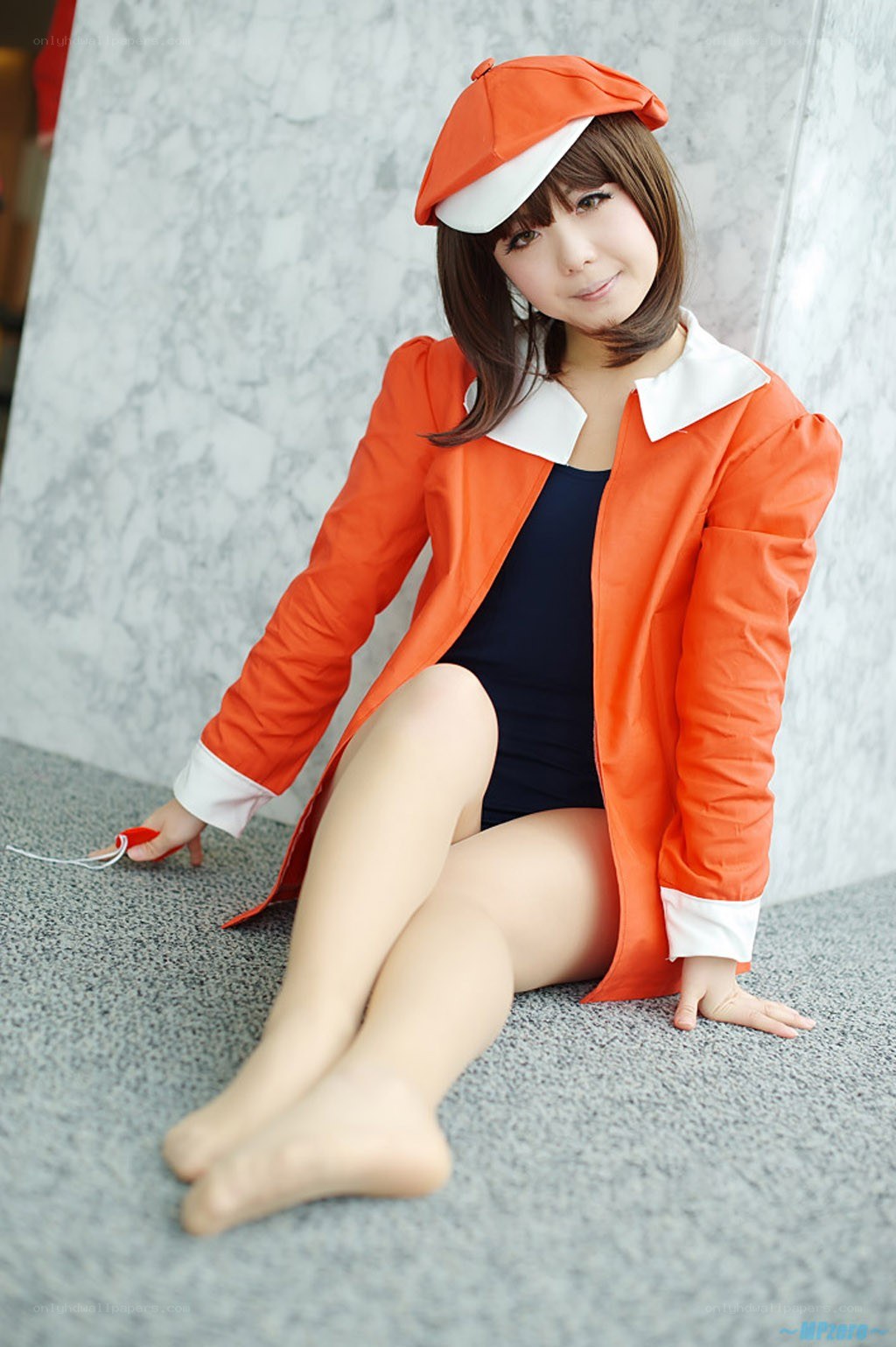 cosplayer in orange coat