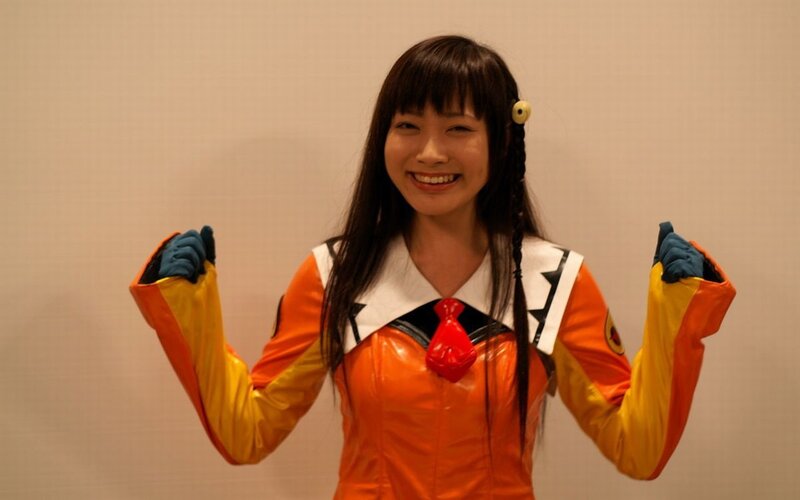 cosplayer in orange costume