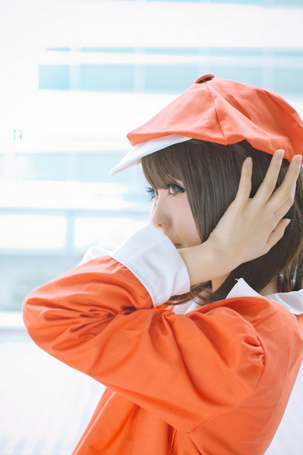 cosplayer in orange outfit