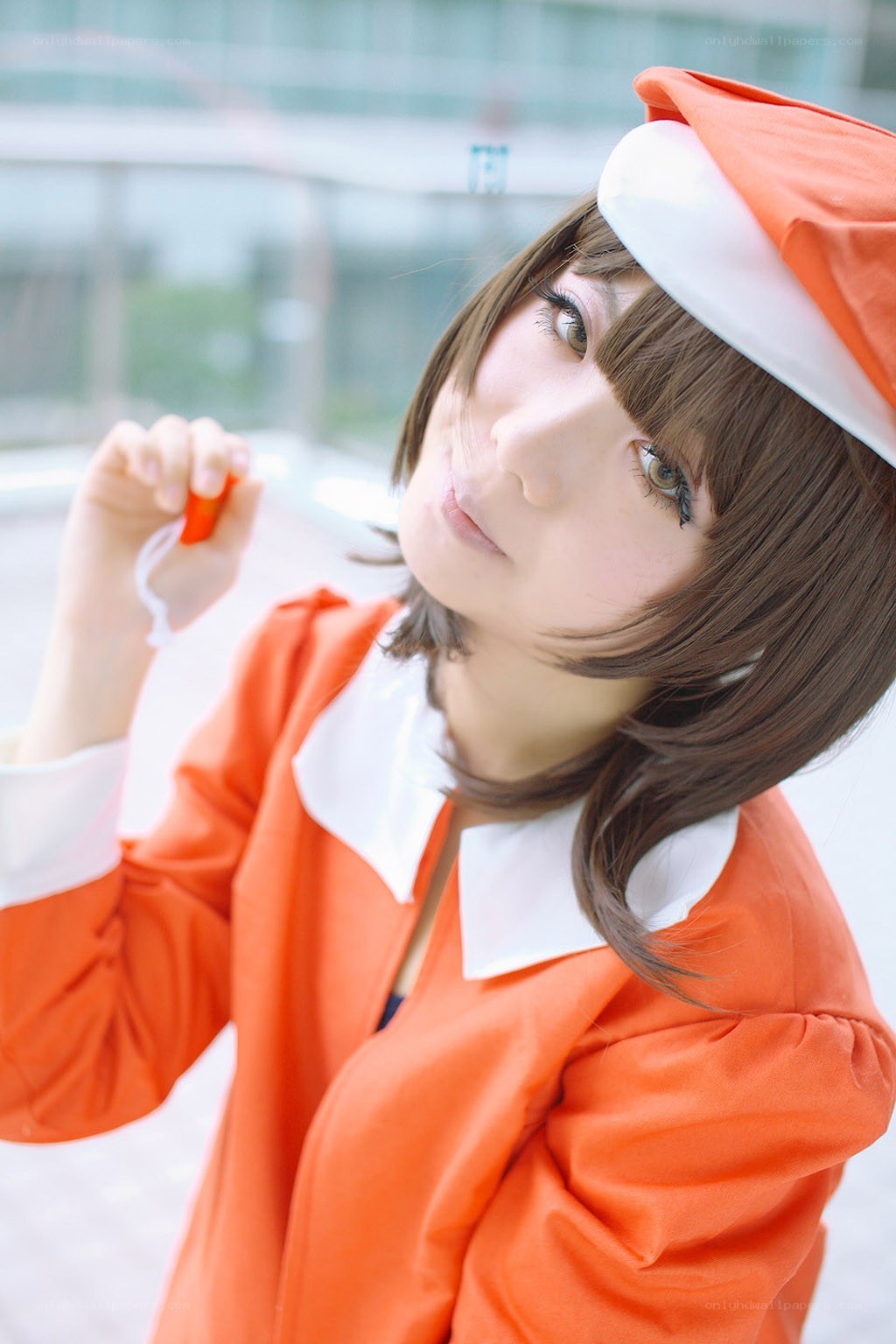 cosplayer in orange outfit