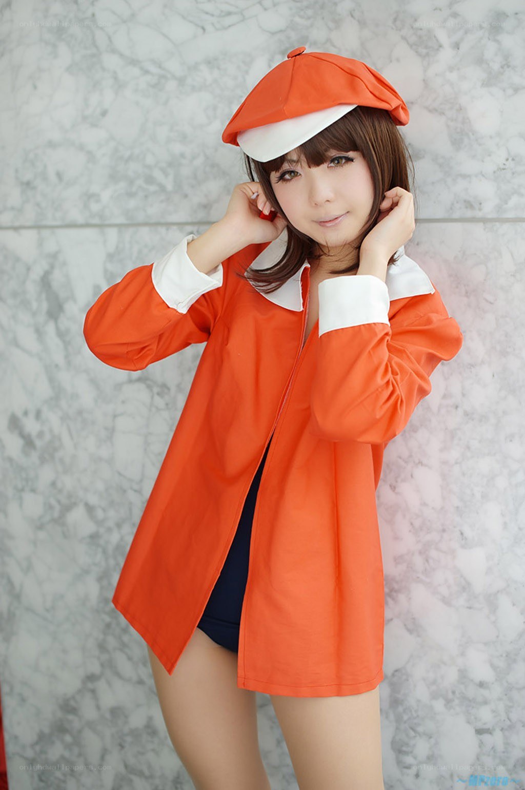 cosplayer in orange outfit