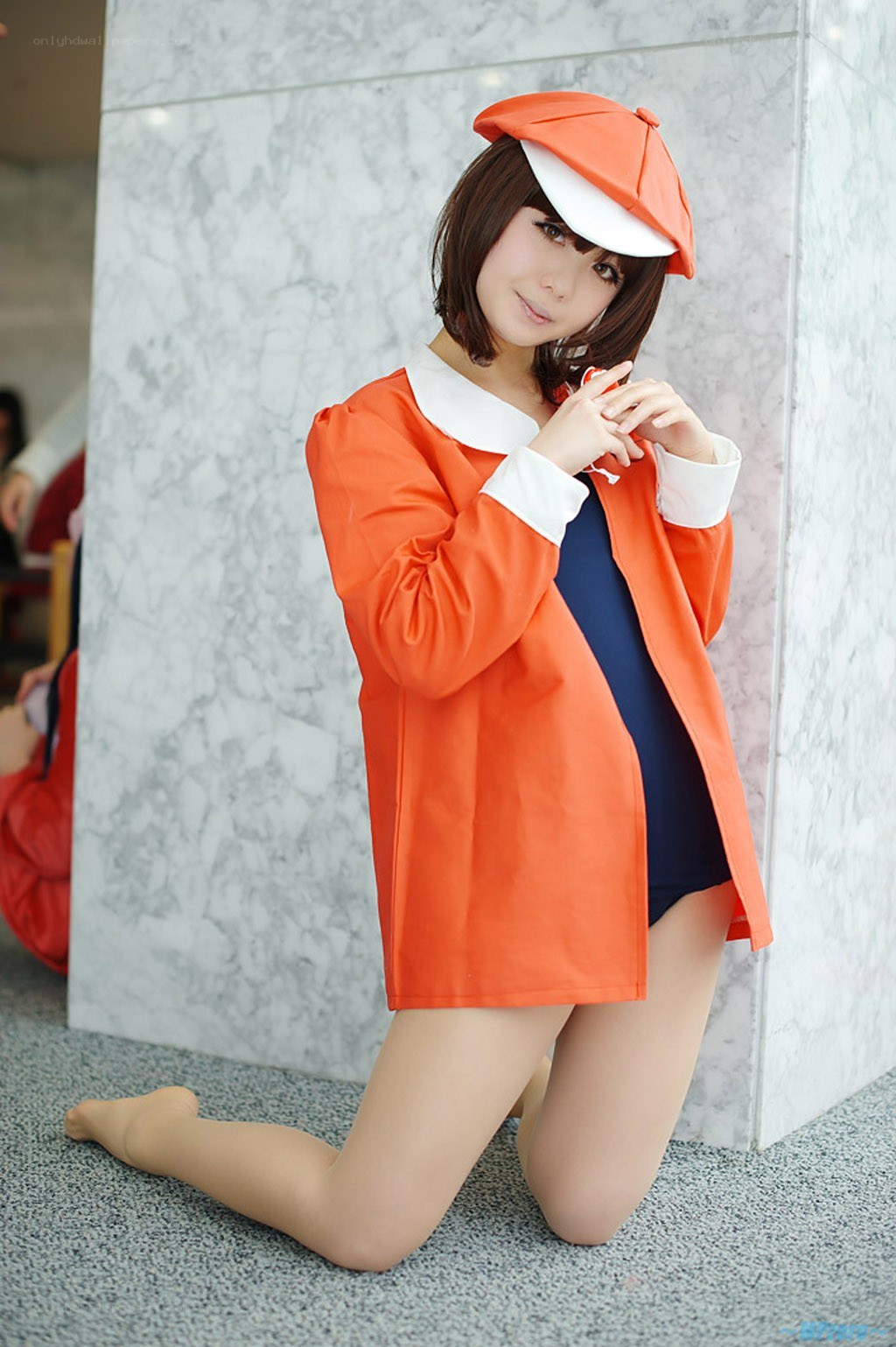 cosplayer in orange outfit