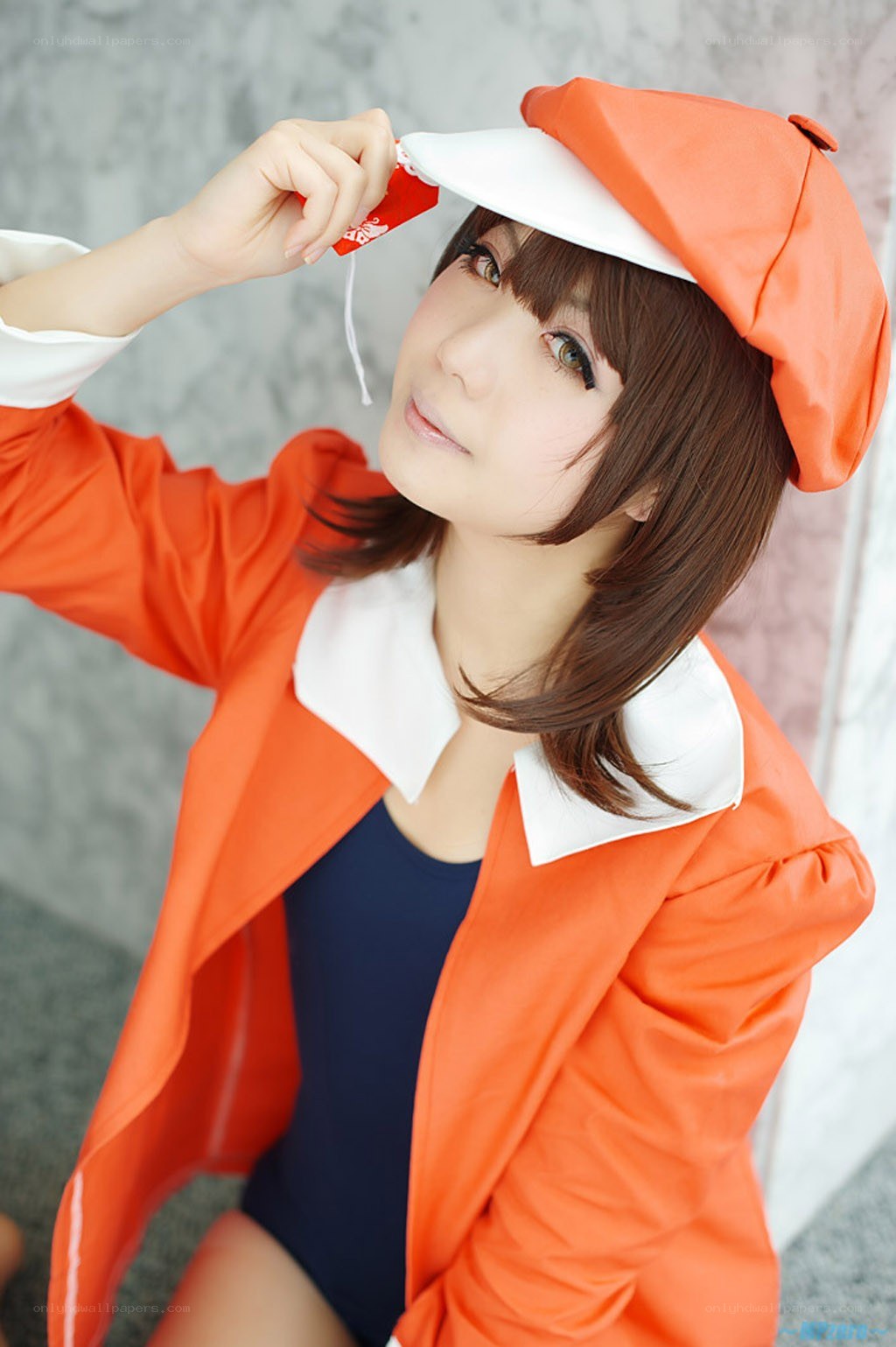 cosplayer in orange outfit