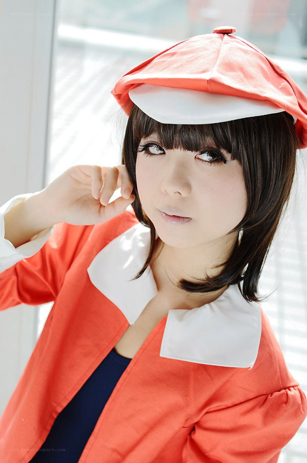 cosplayer in orange outfit