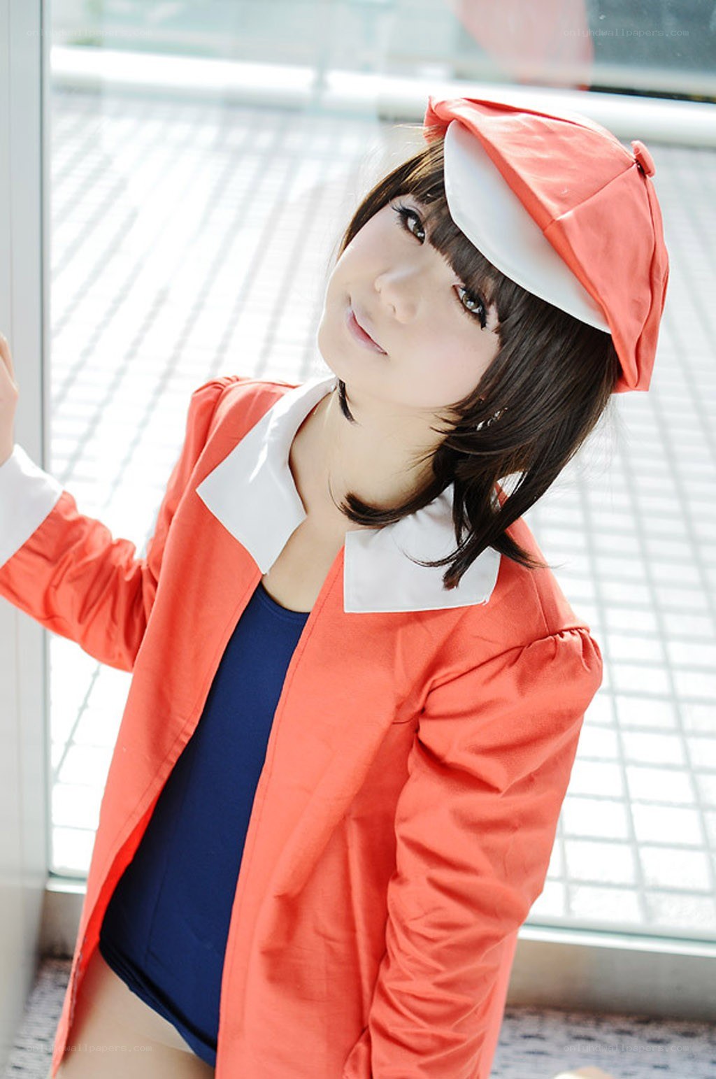 cosplayer in orange outfit