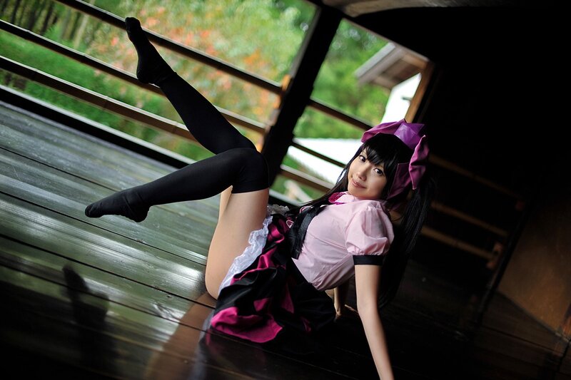 cosplayer in pink and black outfit